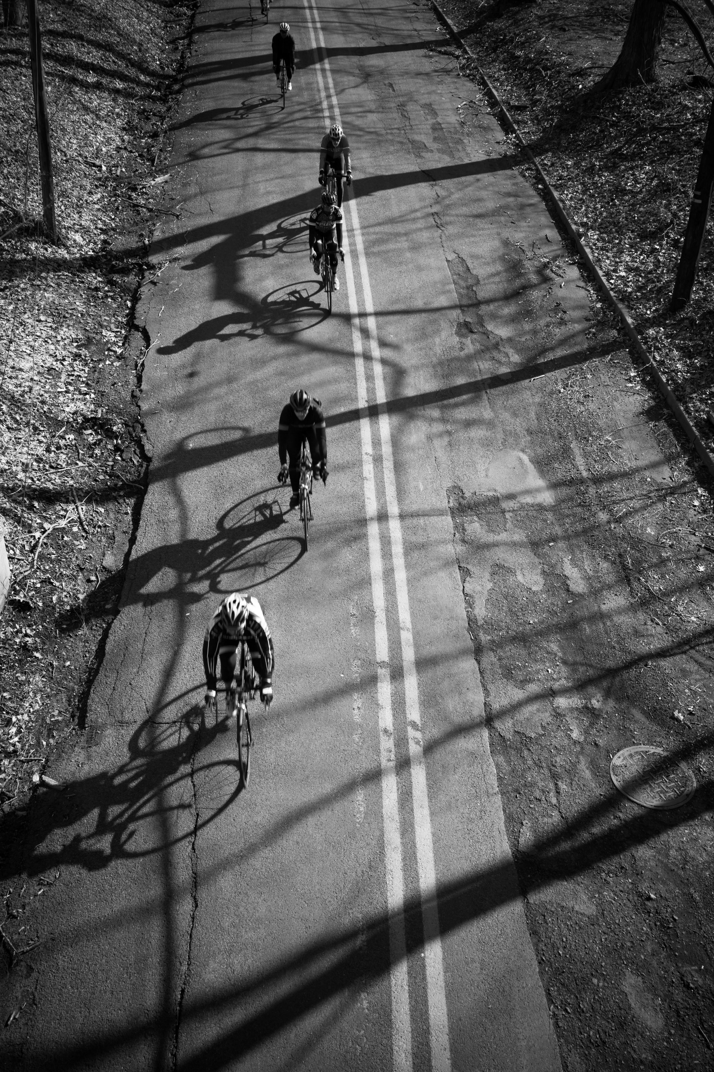 The Sourland Semi-Classic peloton as it moves under the railroad bridge. Photo by Mike Maney Photography.