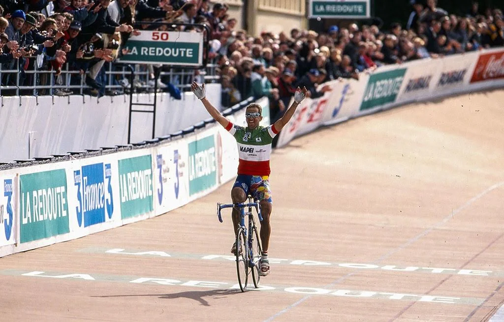 Andrea Tafi crossing the Paris-Roubaix finish first in 1999. Photo courtesy G4 Productions .