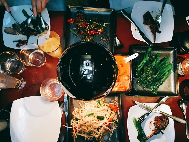 Glamourous group dining at Crazy Bear, Fitzrovia