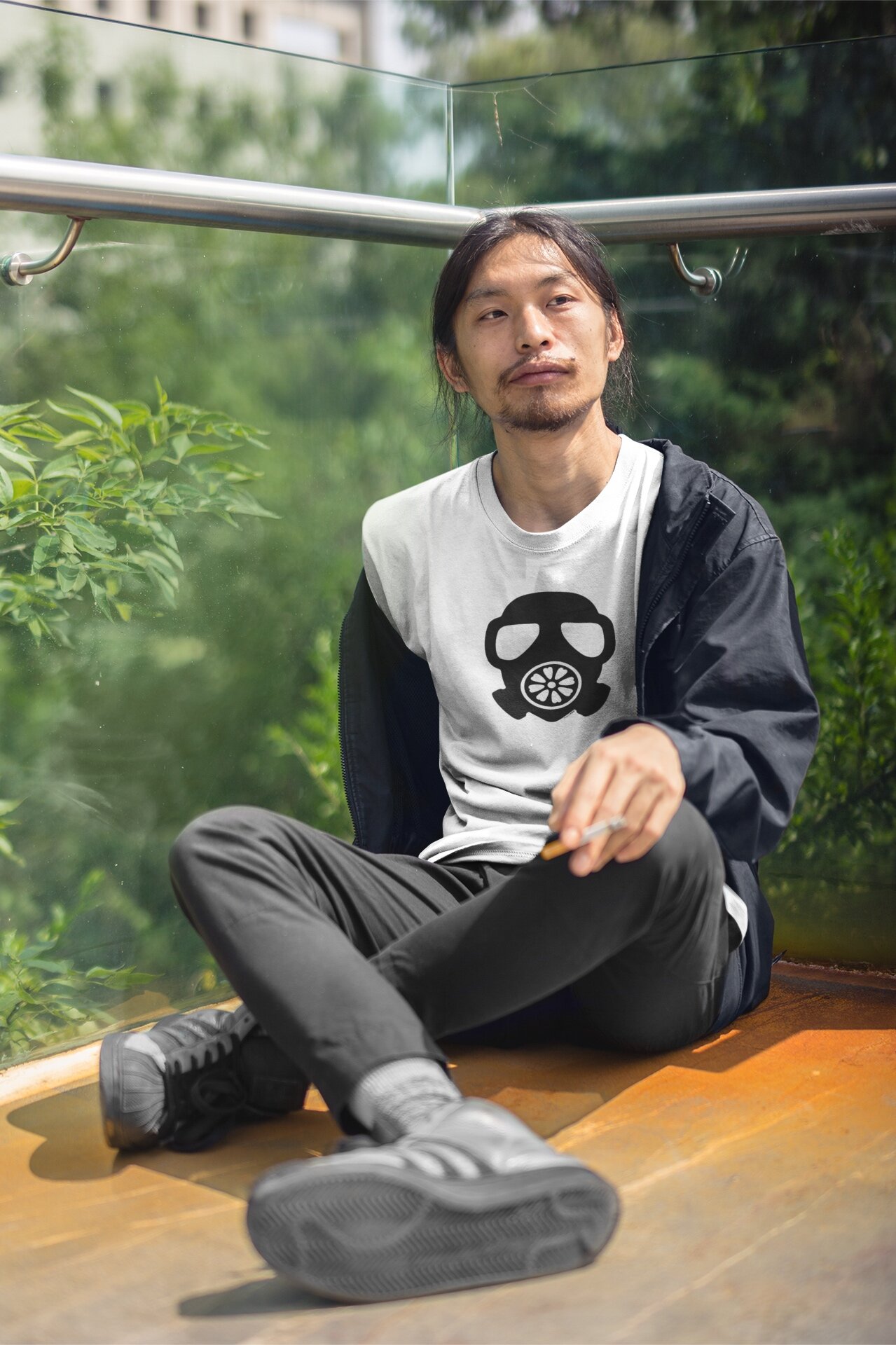 asian-man-wearing-a-round-neck-tshirt-mockup-while-smoking-at-a-balcony-a17789.jpg
