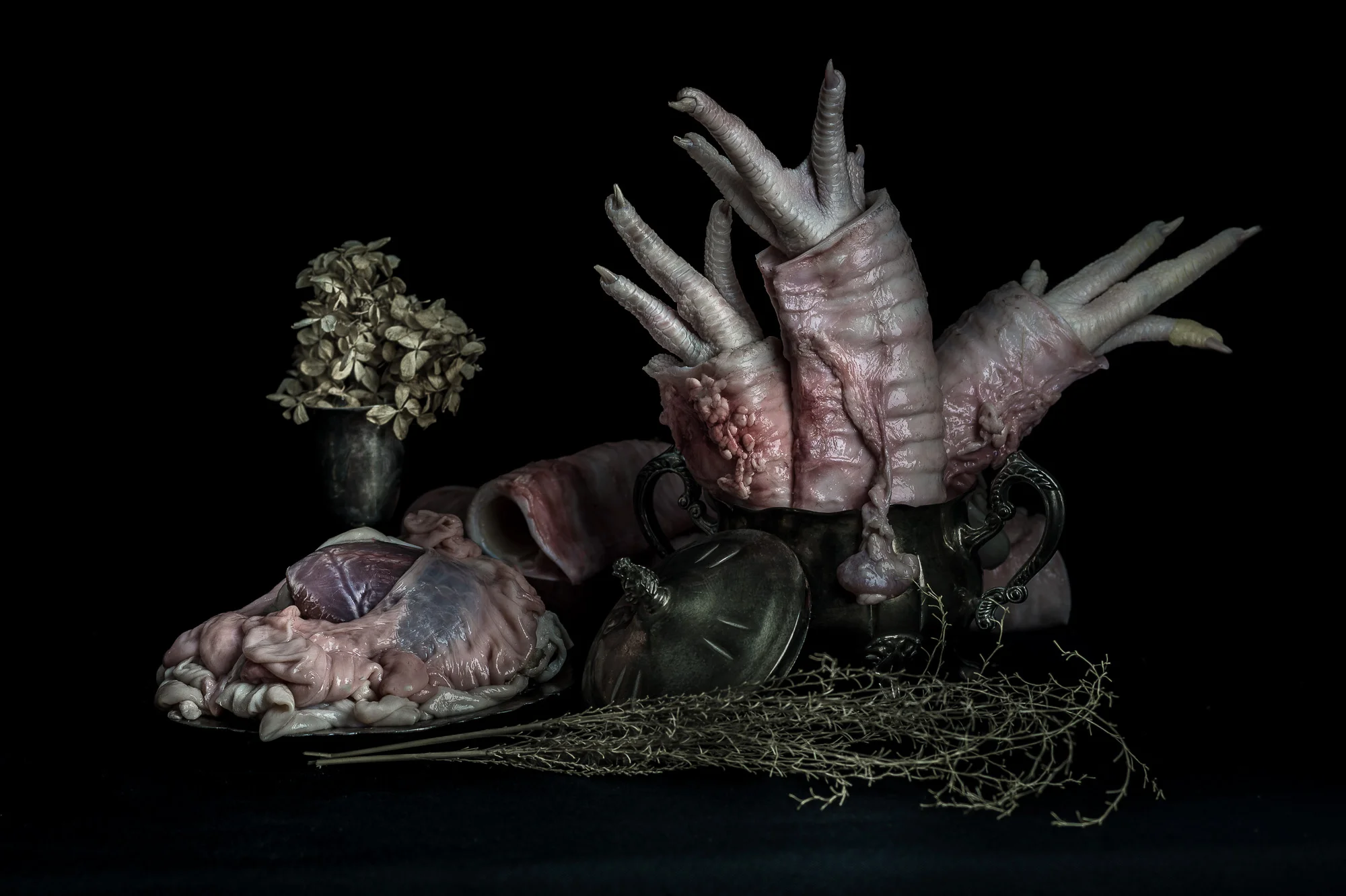 Floral Arrangment with Chicken Feet, Cow Trachea, and Pig Intestines