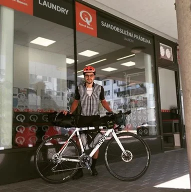 Malte Hager (#36) "Feel like new born. Here in front of ‚my‘ launderette in Brno where I arrived in the morning, washed all my clothes and had a nap. Ready to push southward."
