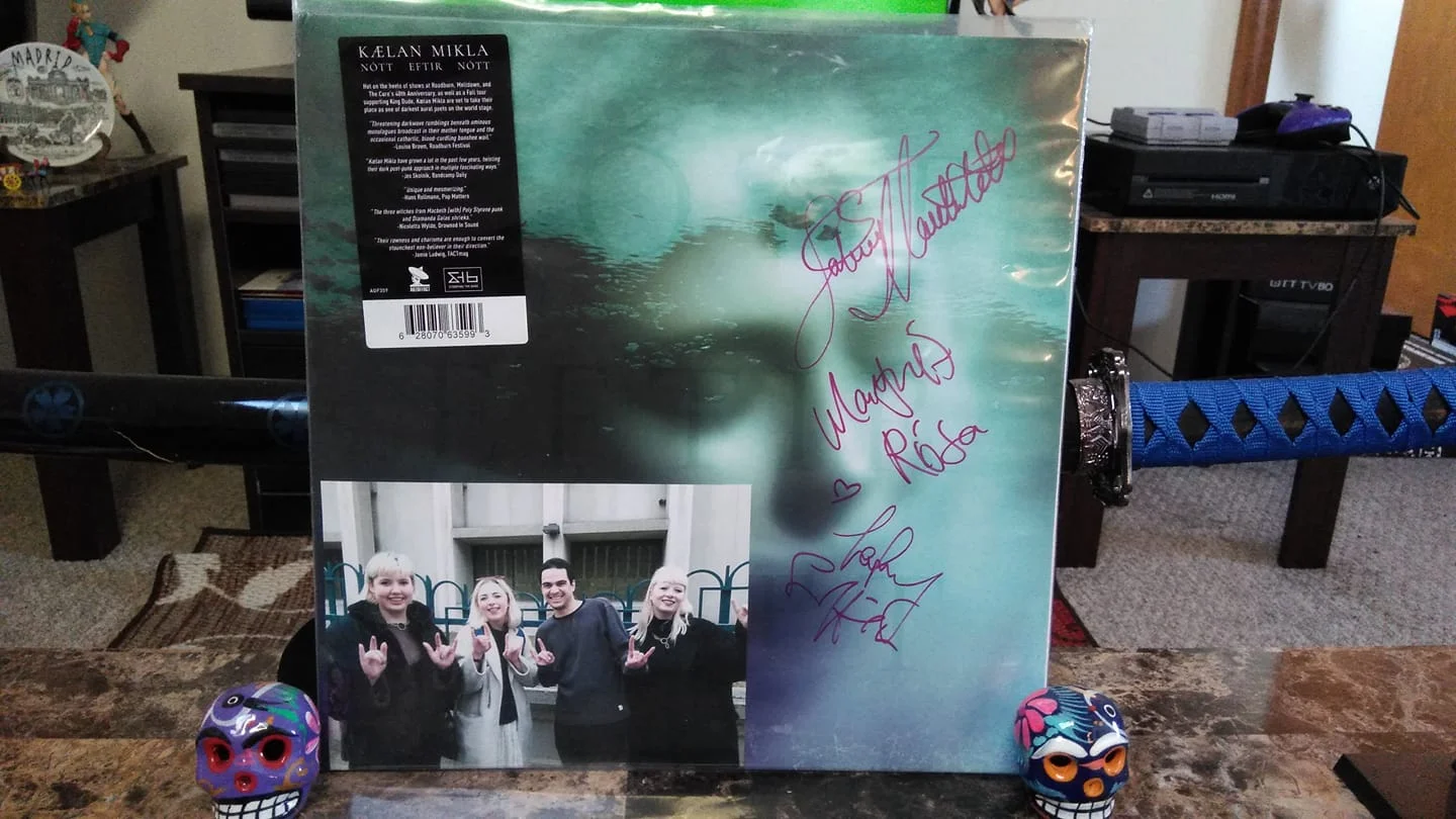signed vinyl in living room.jpg