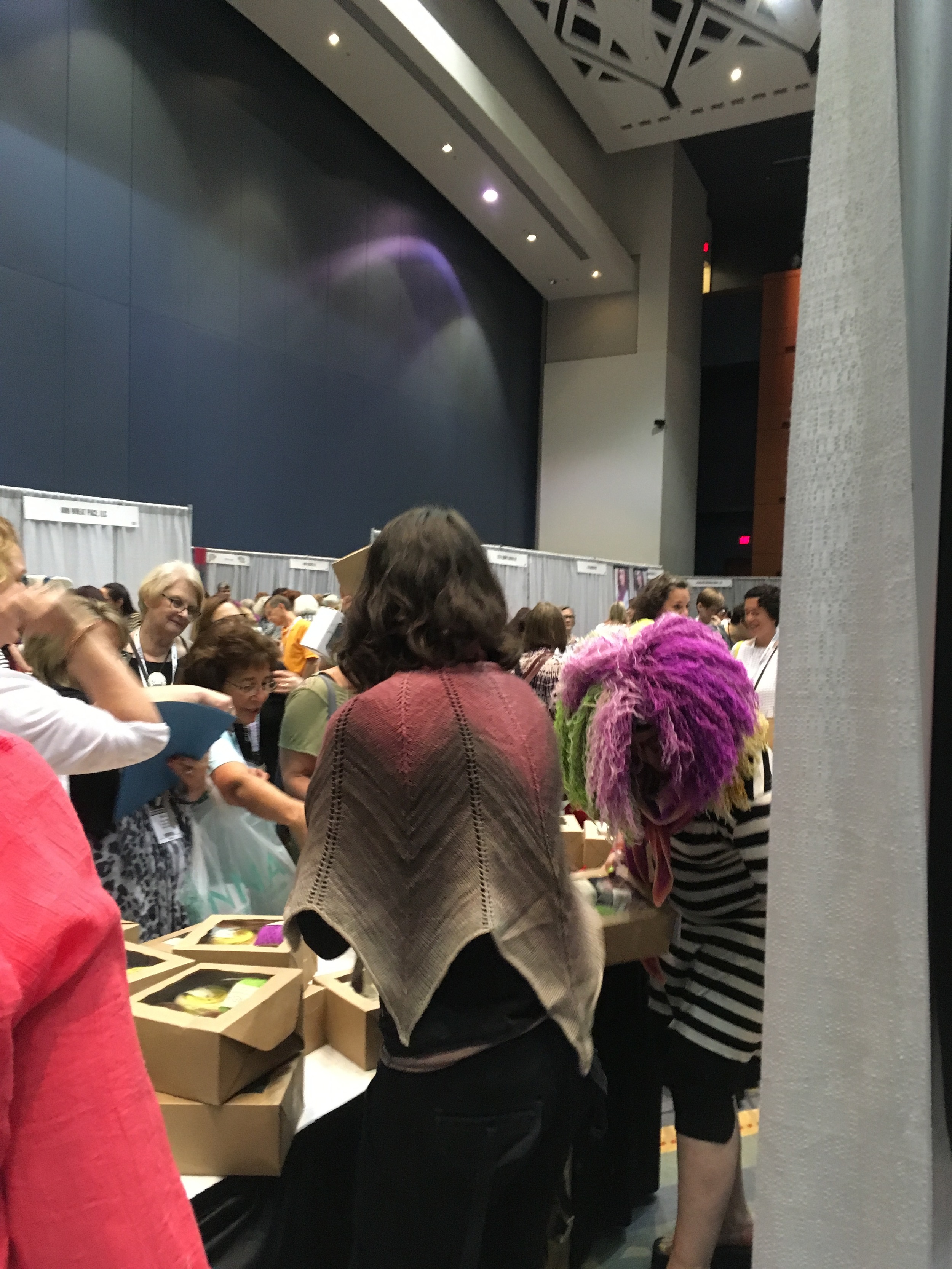 Quite a scene at Sample It. Love the shawl. Less excited about the hair.