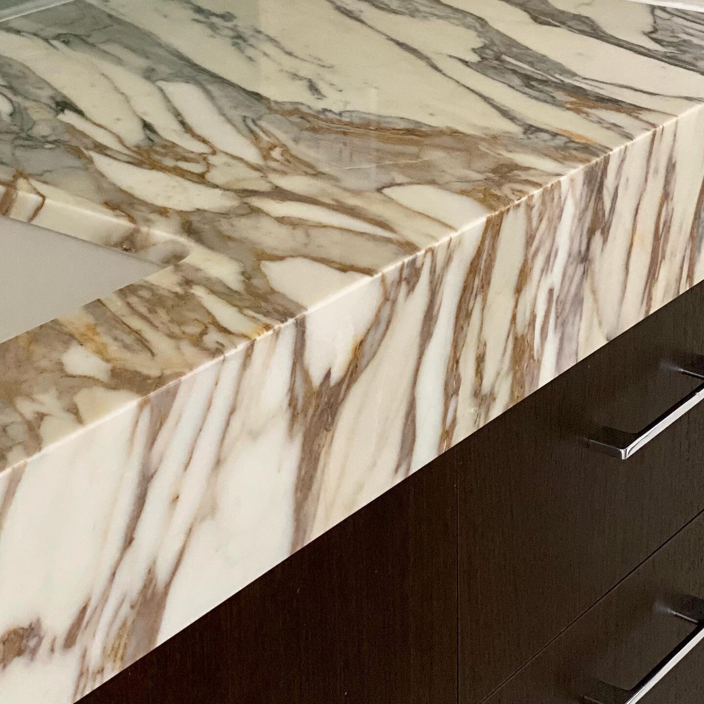 When this counter top went in, the first word I thought of was &ldquo;delicious. &rdquo; My son says it looks like ice cream.

We are either hungry or it&rsquo;s a tasty piece of marble!

#marble #gorgeous #marblecountertops #bathroomdesign #bathroom