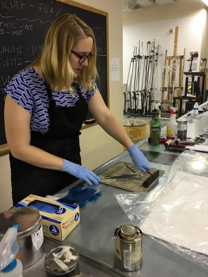 Inking up a wood block at Frogman's Print Workshop in 2016