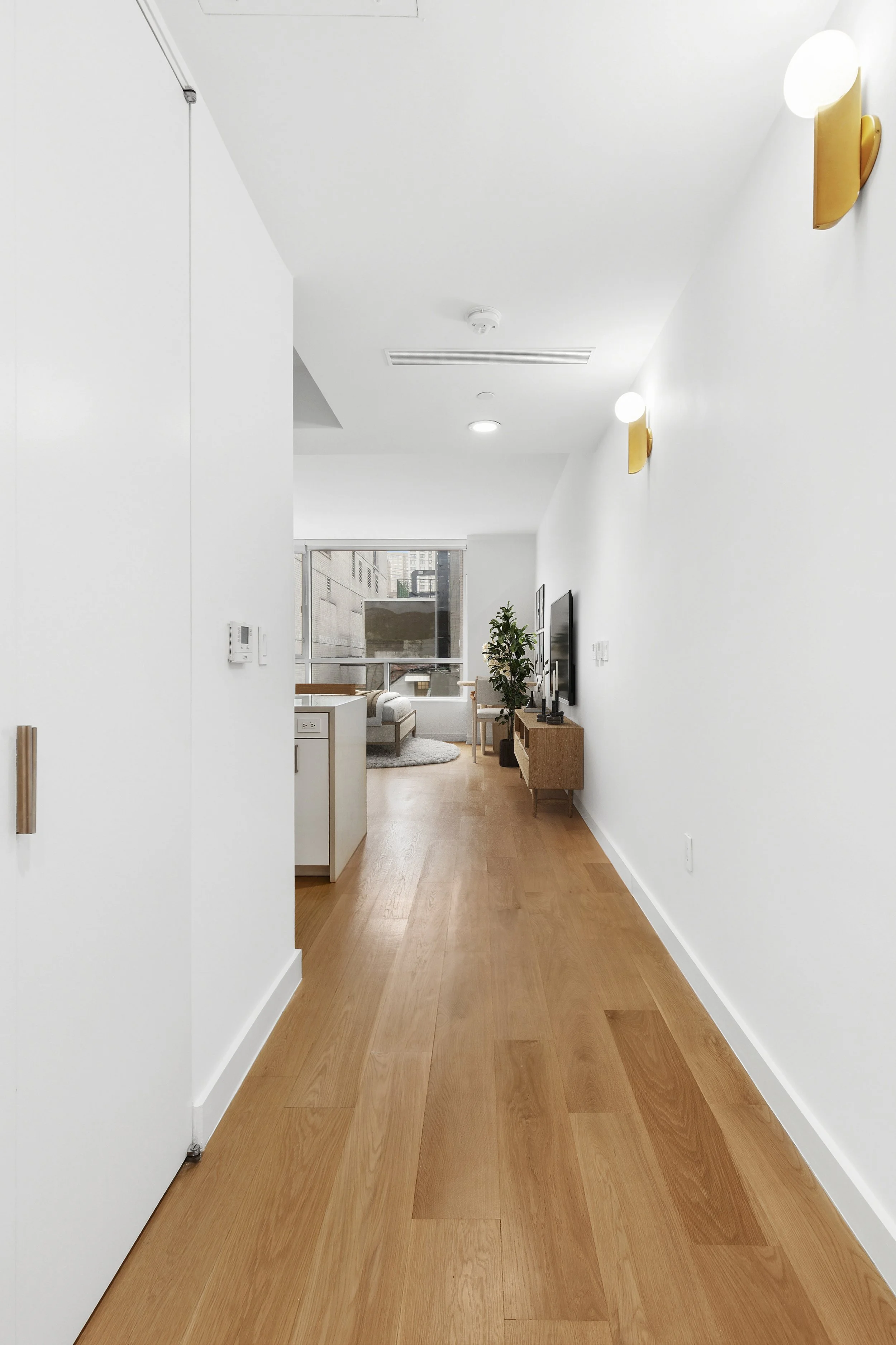 301_E_61st_St_2C_Studio_3_Corrected.jpg