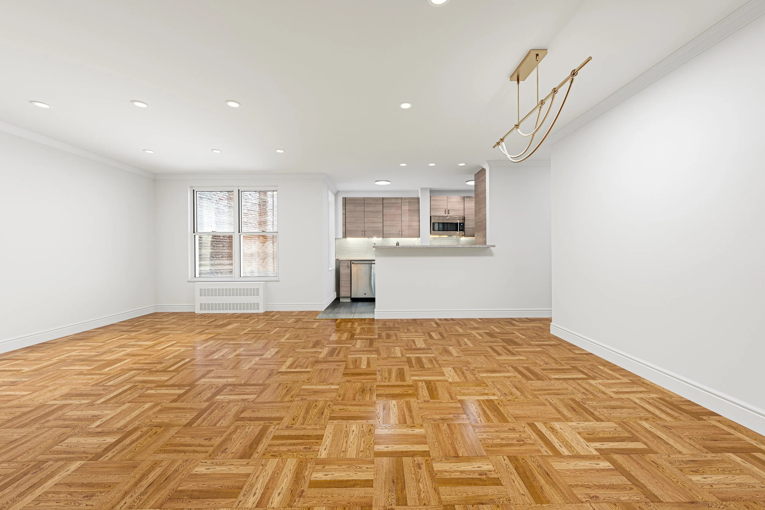 302_E_88th_St_2G_Living_Dining_Empty.jpg