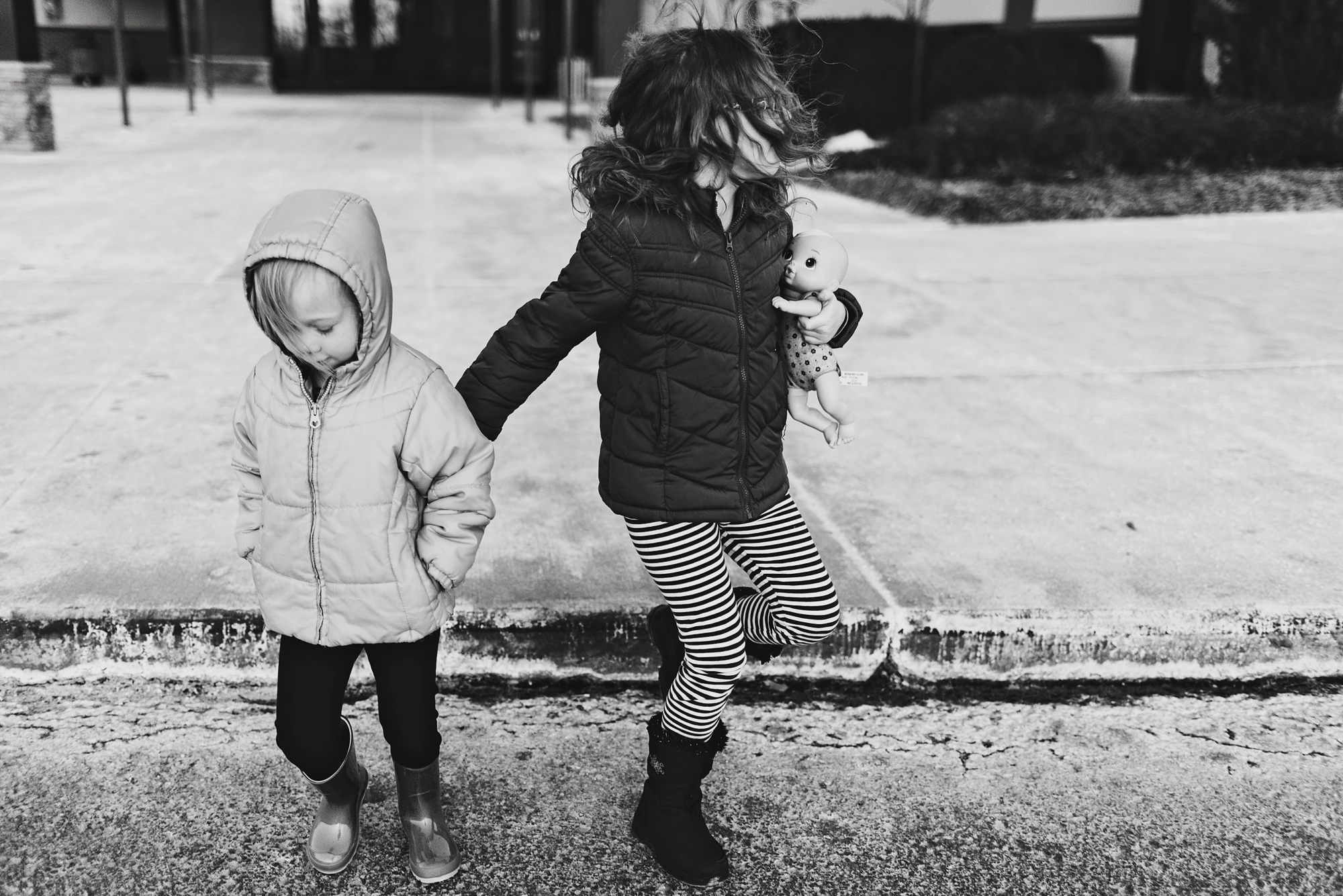 Sisters walking into parking lot