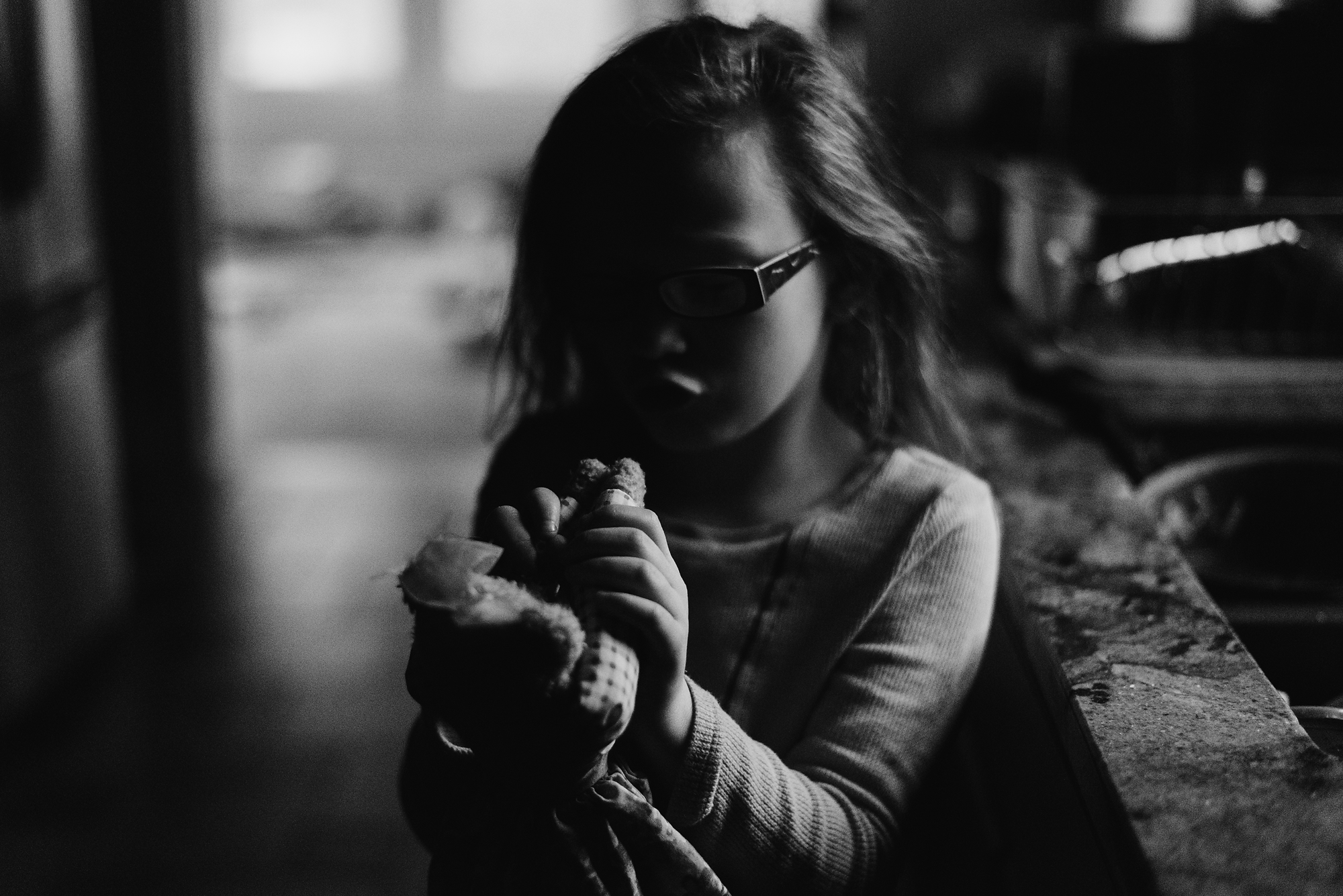 Girl holding teddy bear