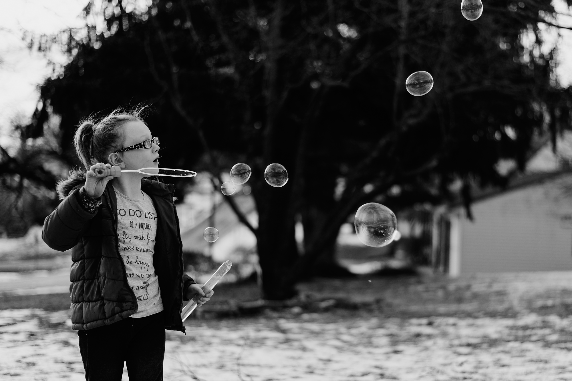 Girl blowing bubbles