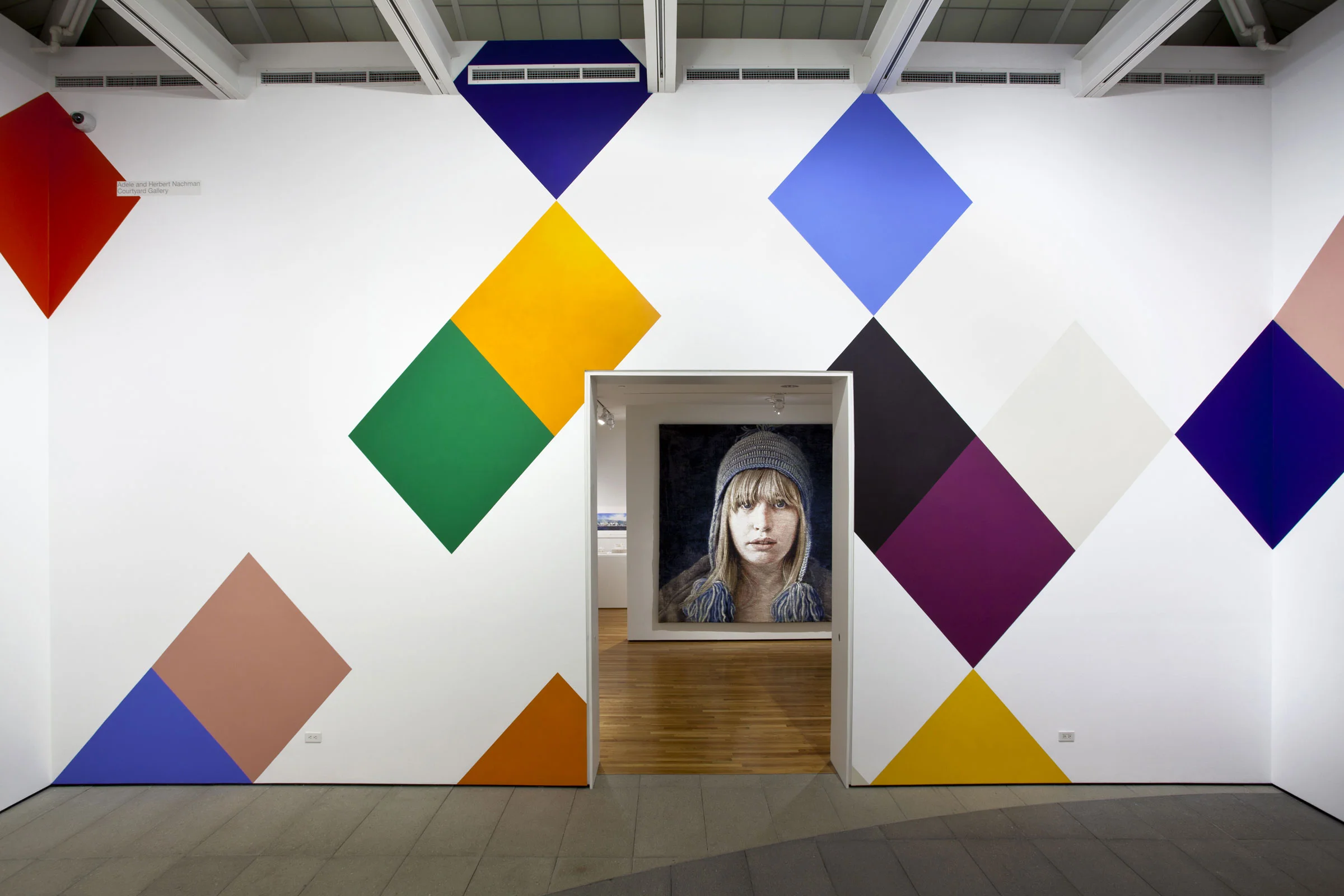 Stars and Candywrappers , 2015, 18’6” x 100’, wall painting installed on all four walls of the Nachman Gallery, Museum of Art, Design and Architecture, University of California Santa Barbara. On view September 25, 2015-May 1, 2016.