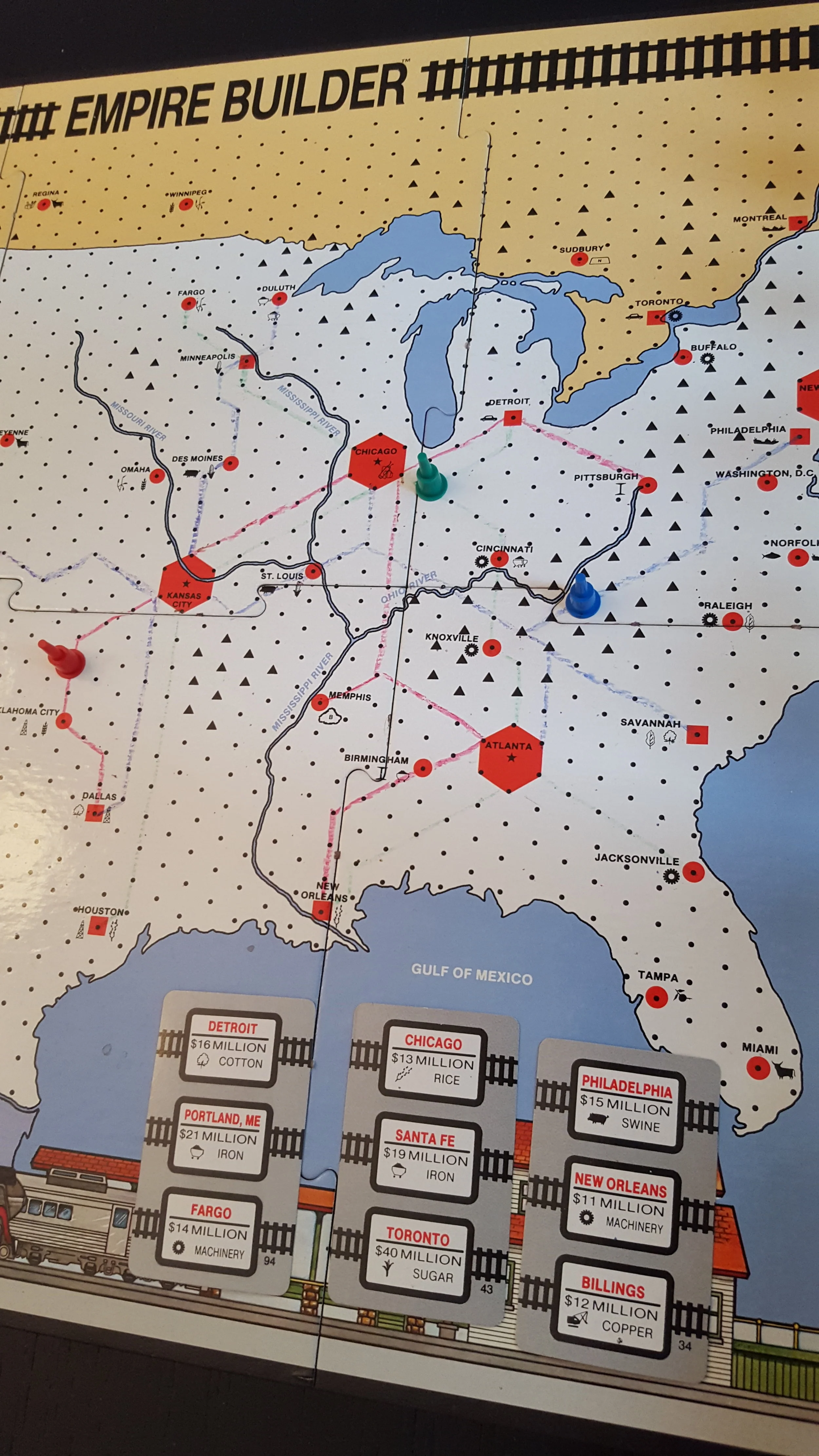 Empire Builder game in progress with three players and example demand cards.