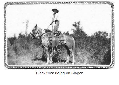 Black Trick Riding on Ginger.JPG