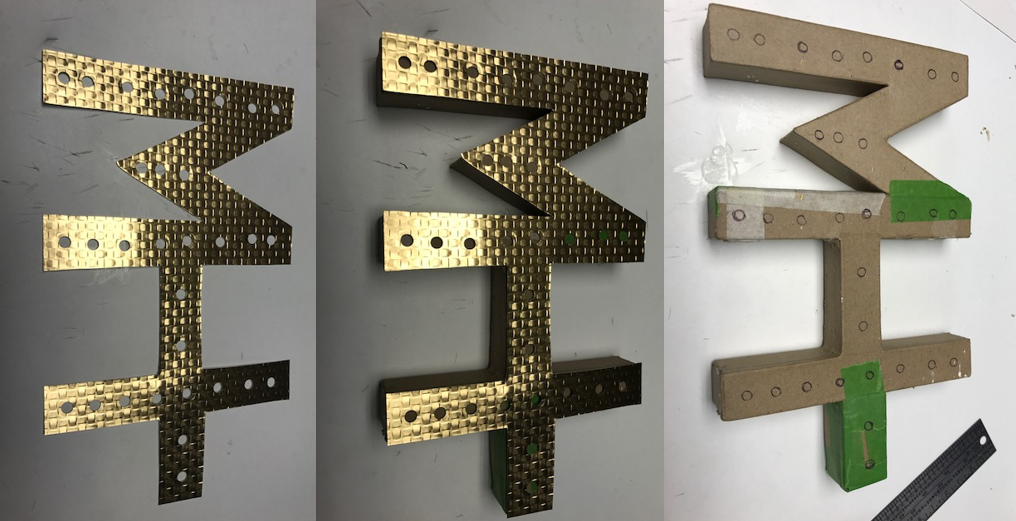 michael-helwig-interiors-light-up-marquee-punch-holes