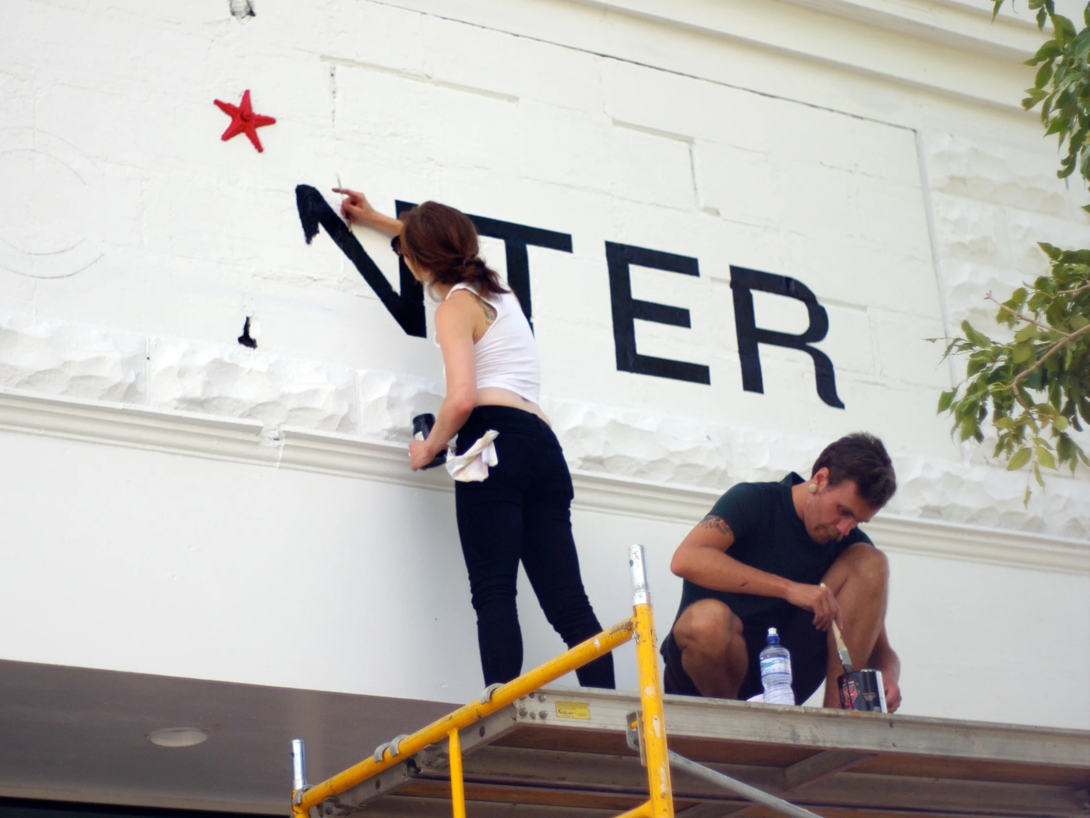 Front signage in process, 2011. Photo by Frontier Fellow Nick Zdon.