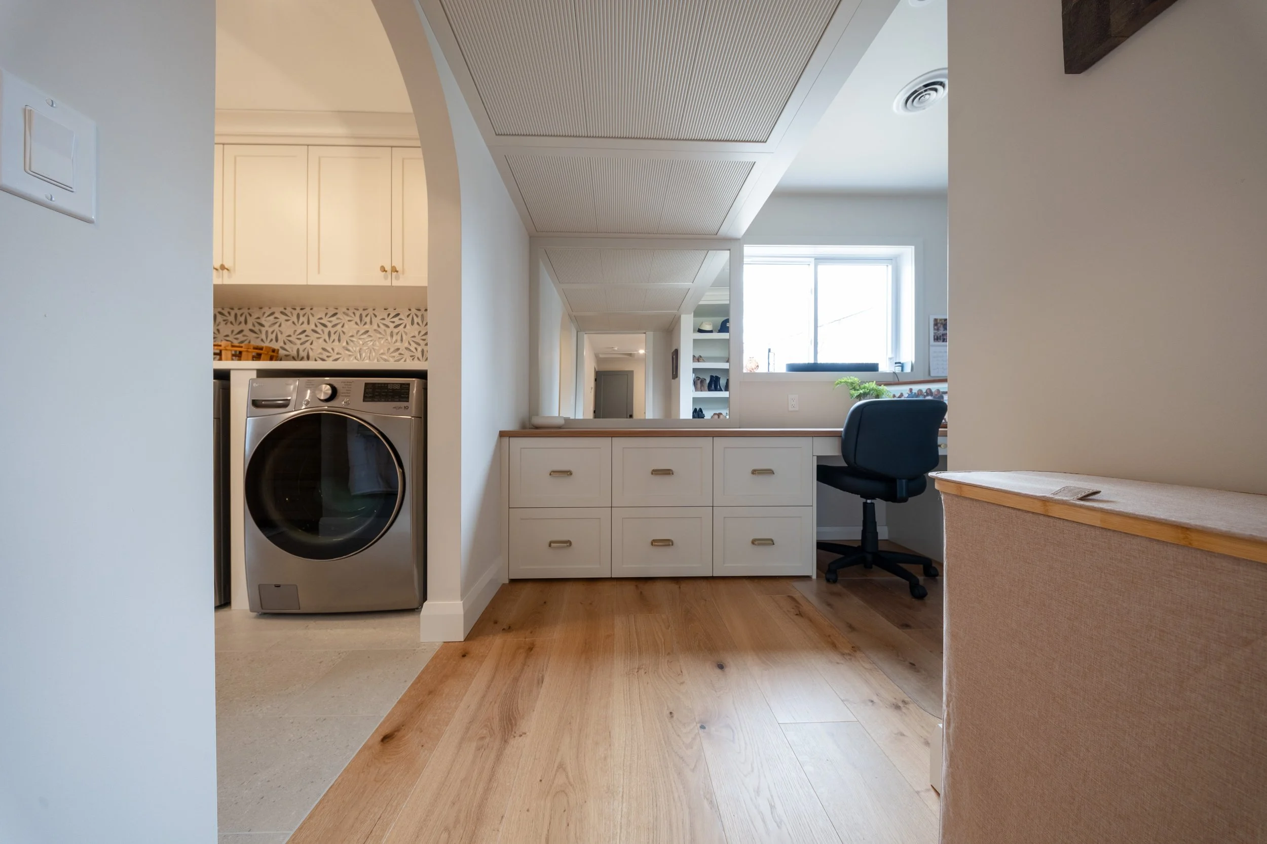 Decorative panels designed to hide mechanical equipment within a closet space
