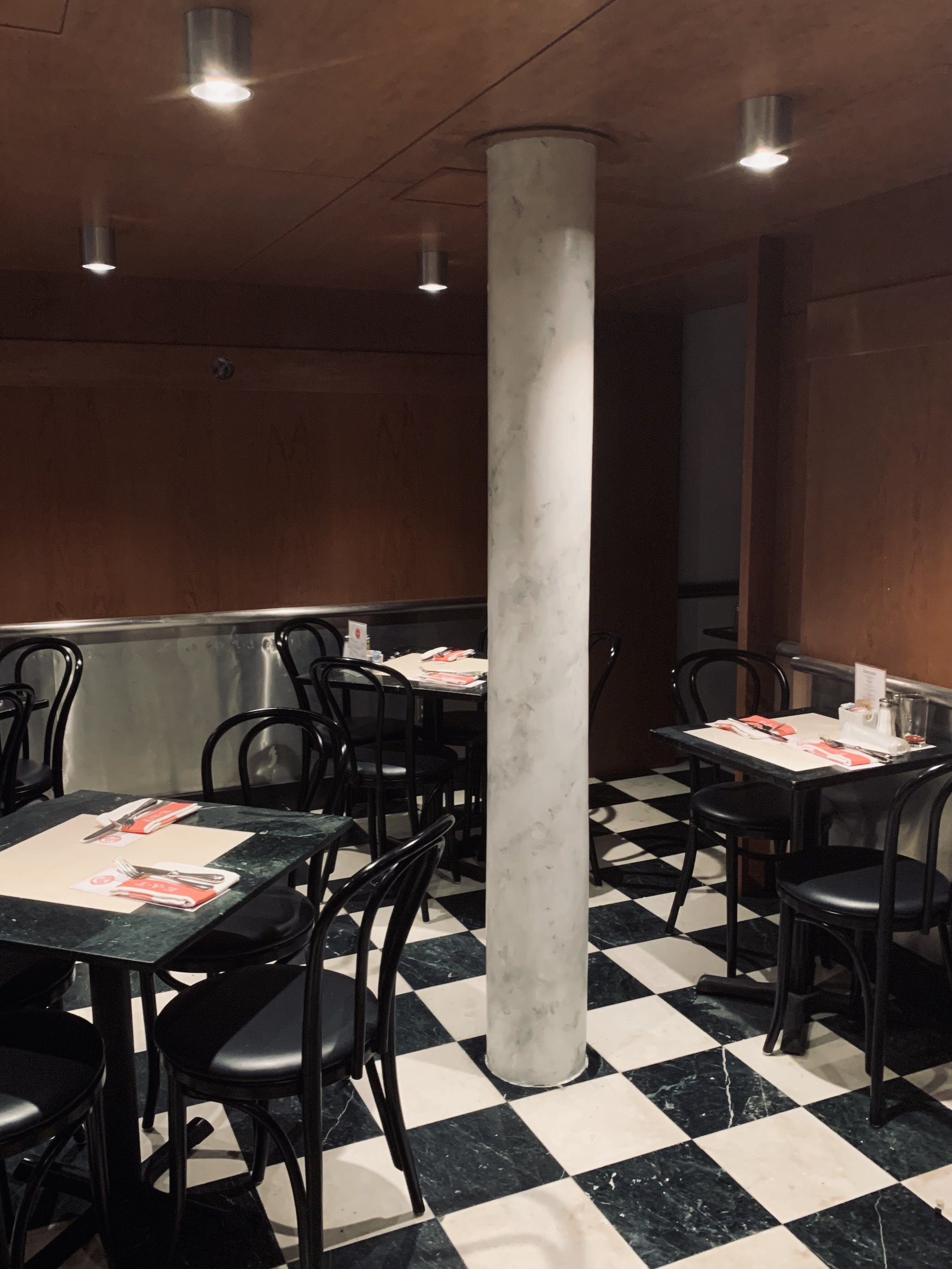 white marble renderd co;umn, Eat Restaurant, 1064 Madison Ave NYC, 2024