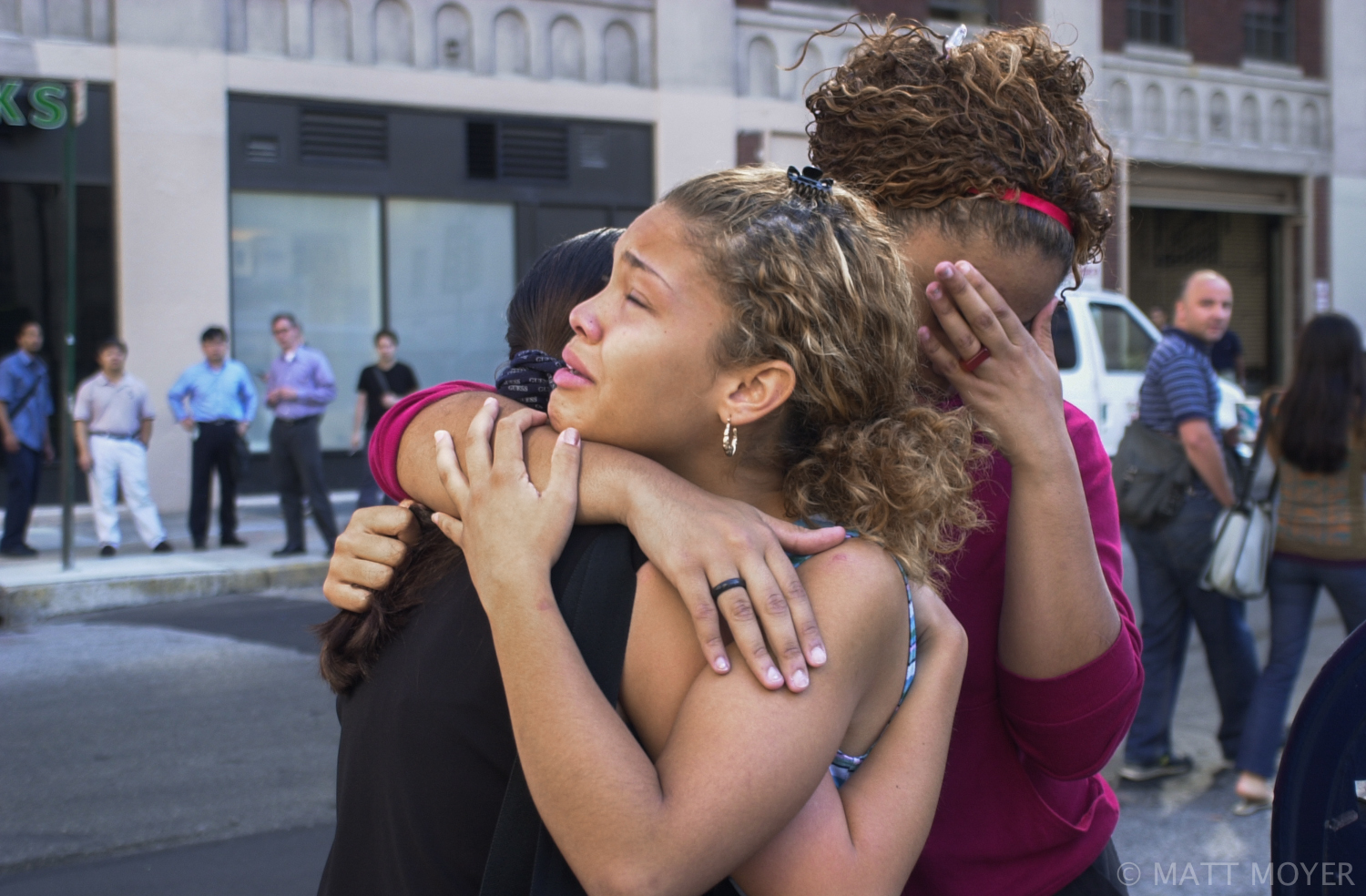  Lisa Bianco (right) and two women comfort one another during the terrorist attack on The World Trade Center on Sept. 11, 2001. 