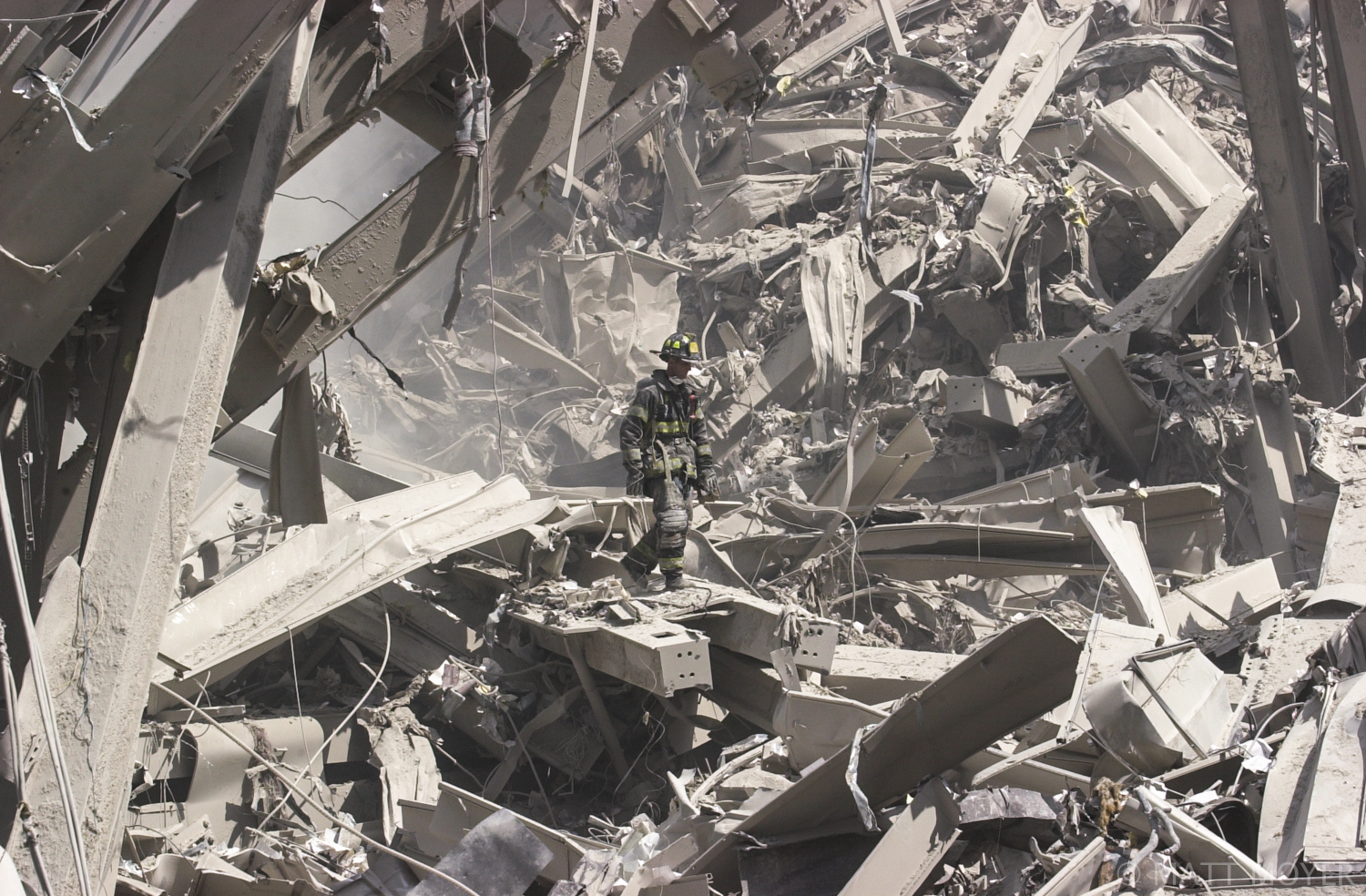  Firefighters search for survivors after the collapse of the World Trade Center on Sept. 11, 2001. 