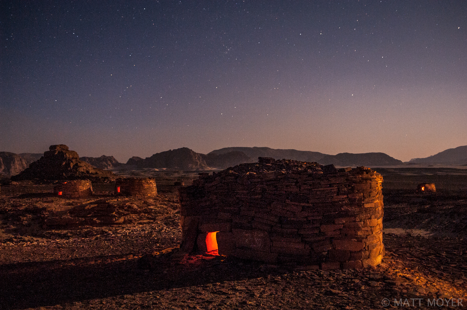  Nawamees stone structures are illuminated by moonlight in the desert between Nuweiba and St. Catherine, Egypt. These structures were constructed between 4000 and 3150 BC. Their use is unknown but they are thought to perhaps be tombs or burial chambe