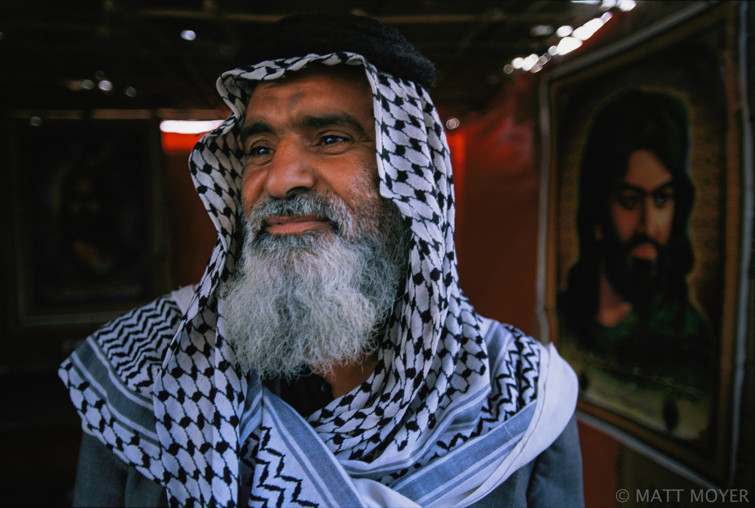  A watchman at a Najaf market has thieves, and more, to worry about in the chaos of post-Saddam Iraq in Najaf, Iraq. Factional struggles have provokes armed clashes between supporters of rival clerics in the holy city. 