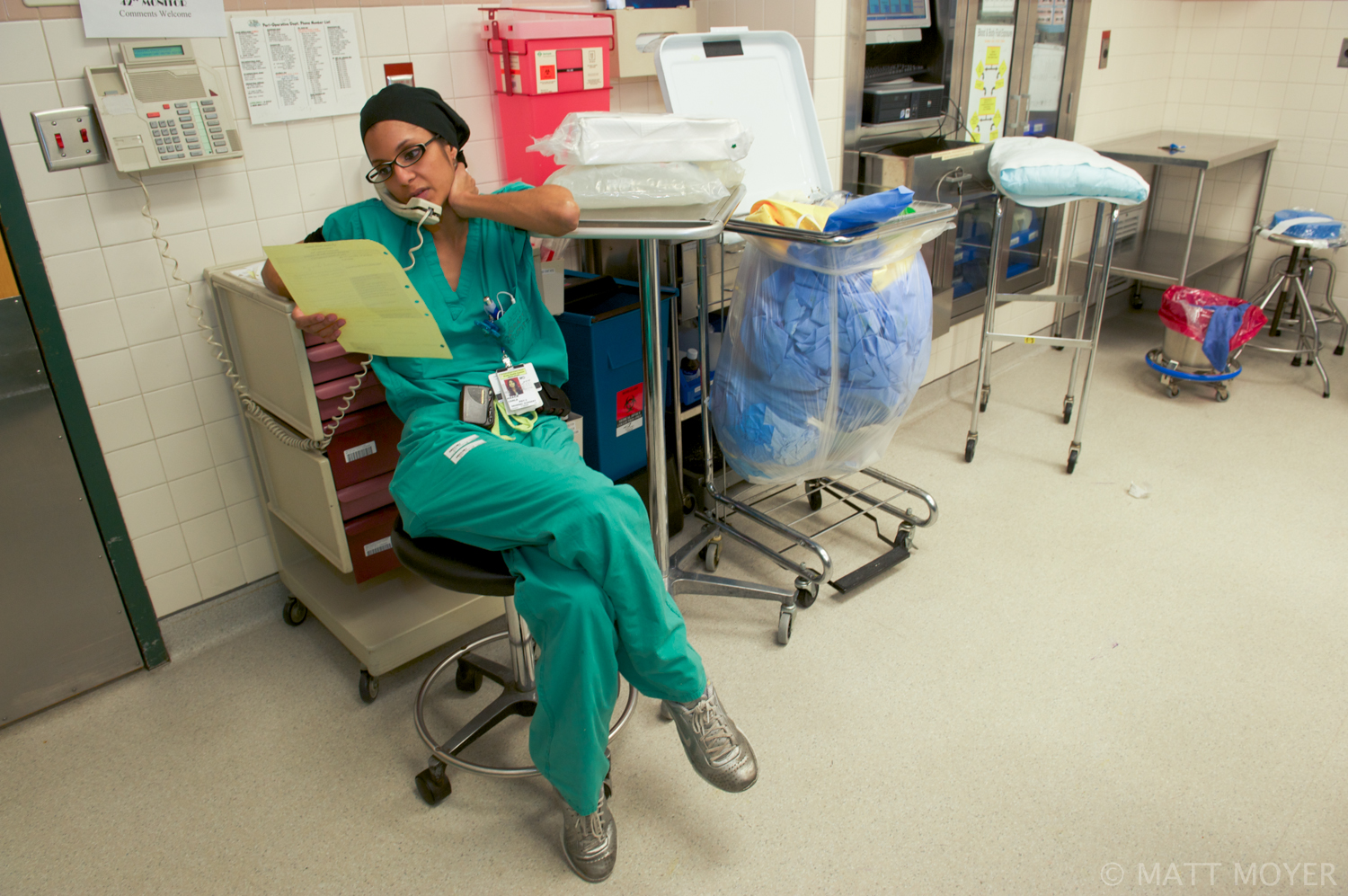  Dr. Carla Haack, a twenty five-year-old surgical resident, multi tasks after completing a surgery at Grady Memorial Hospital. 