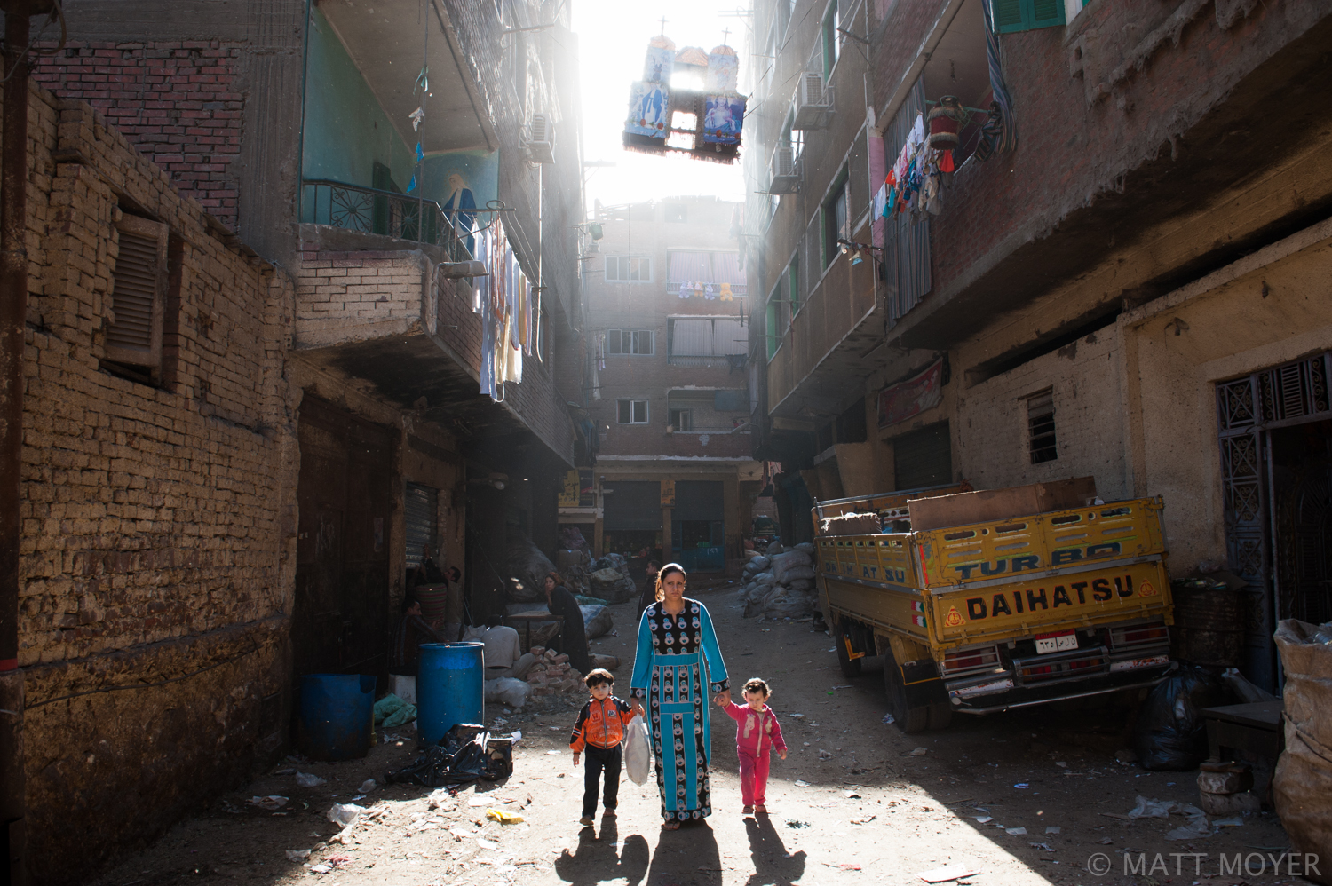  Egyptians walk in the street in a Coptic Christian part of town in Cairo, Egypt. 