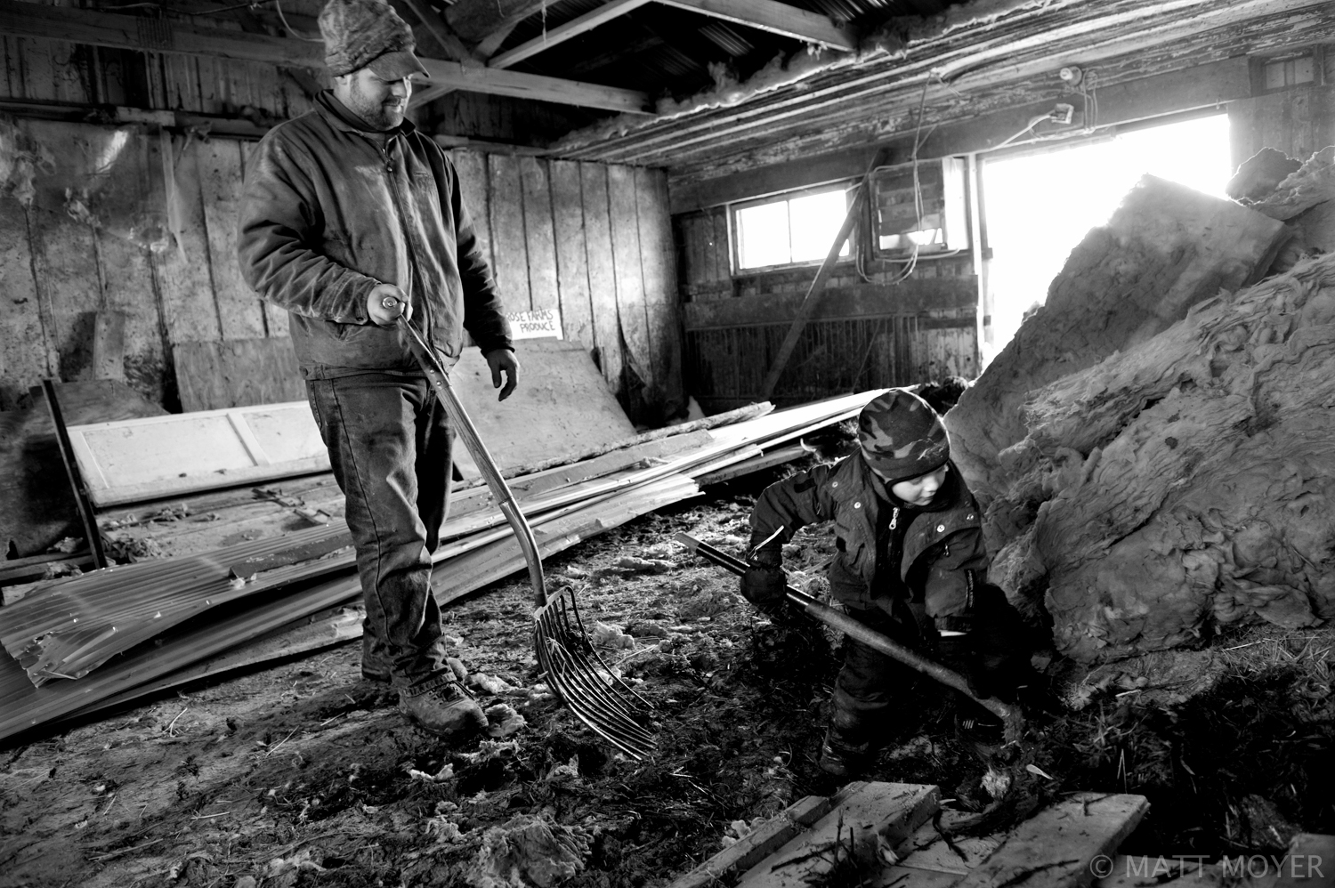  d Tidd watches as his son, AJ Tidd, 4, helps out with chores on the small dairy farm he runs in Auburn, NY. 