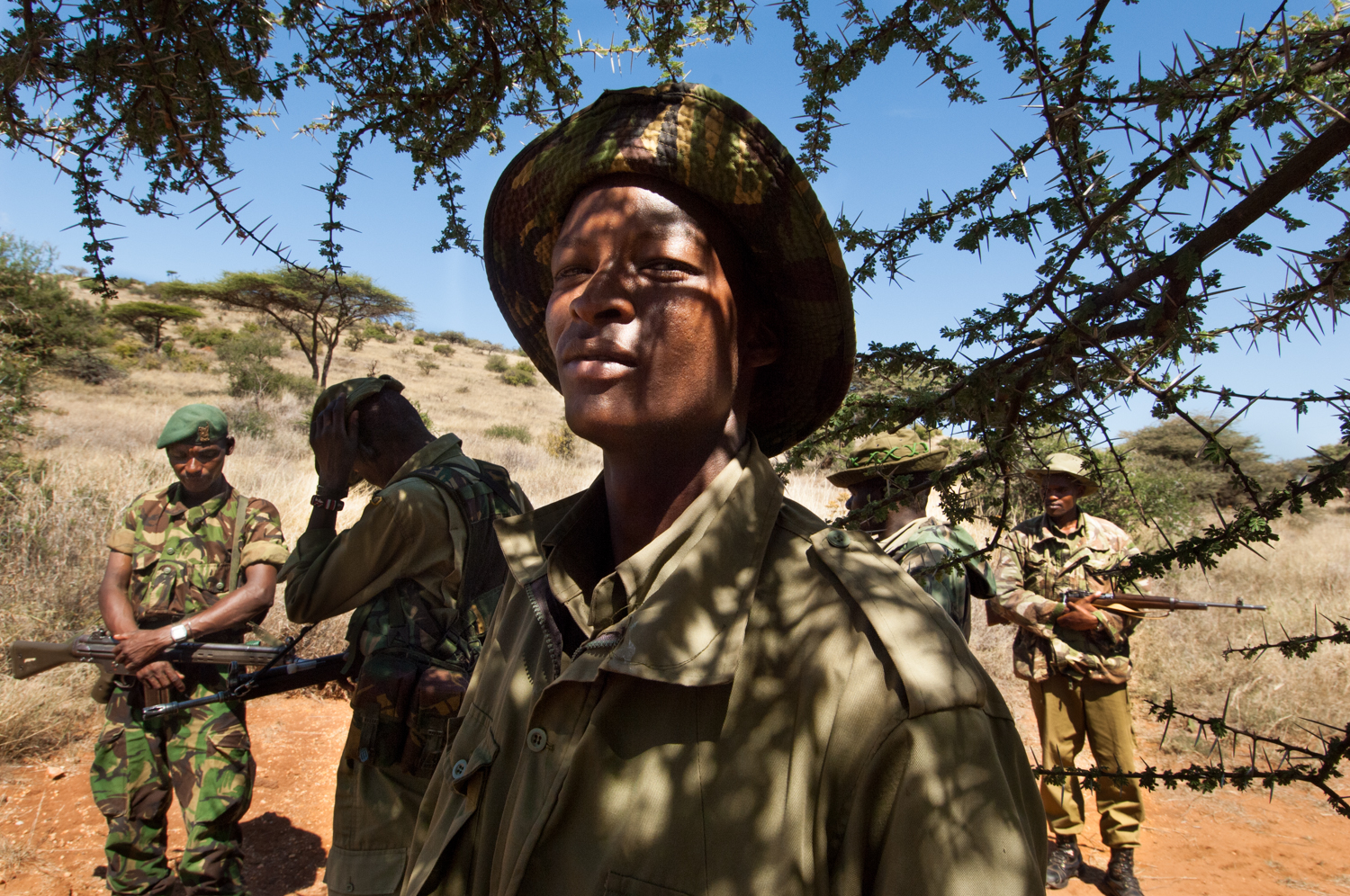  Members of an anti-poaching unit patrol the wildlife park in Lewa Downs, Kenya. 