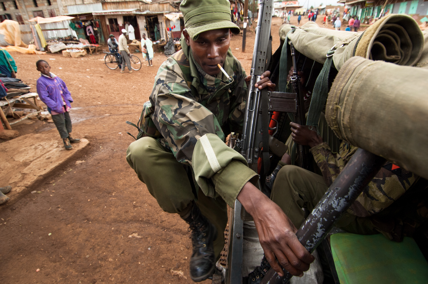  Members of an anti poaching unit based at the Lewa Wildlife Conservancy in Northern Kenya ride on their way to patrol a neighboring area Lewa Downs, Kenya. 