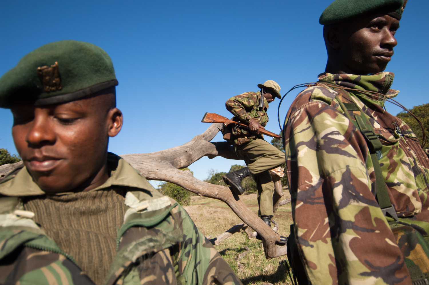  Members of an anti-poaching unit patrol a neighboring sanctuary wildlife park in Lewa Downs, Kenya. 