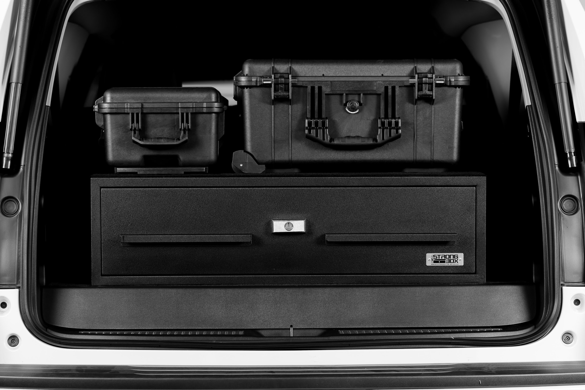 Tahoe back with Pelican Cases.jpg
