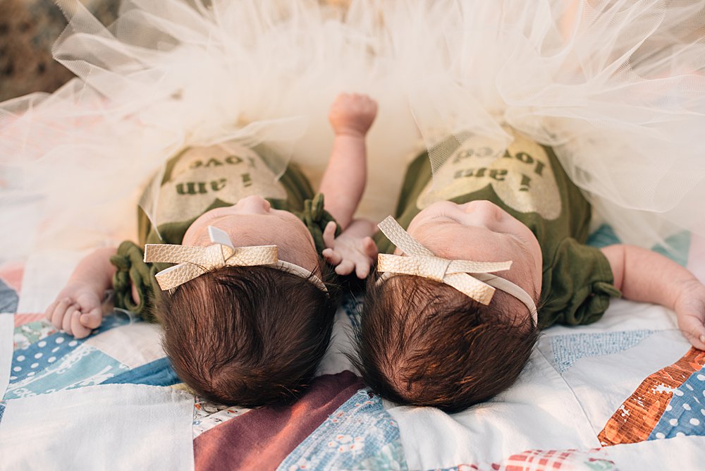  photo of twin newborn girls taken from above 