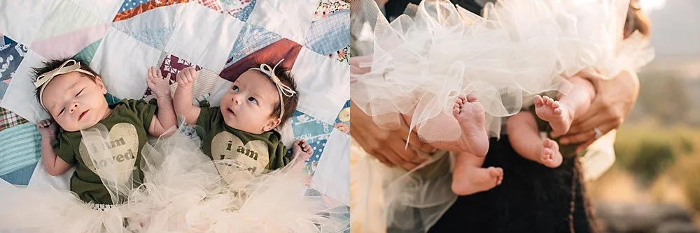 twin baby girls laying on a vintage quilt