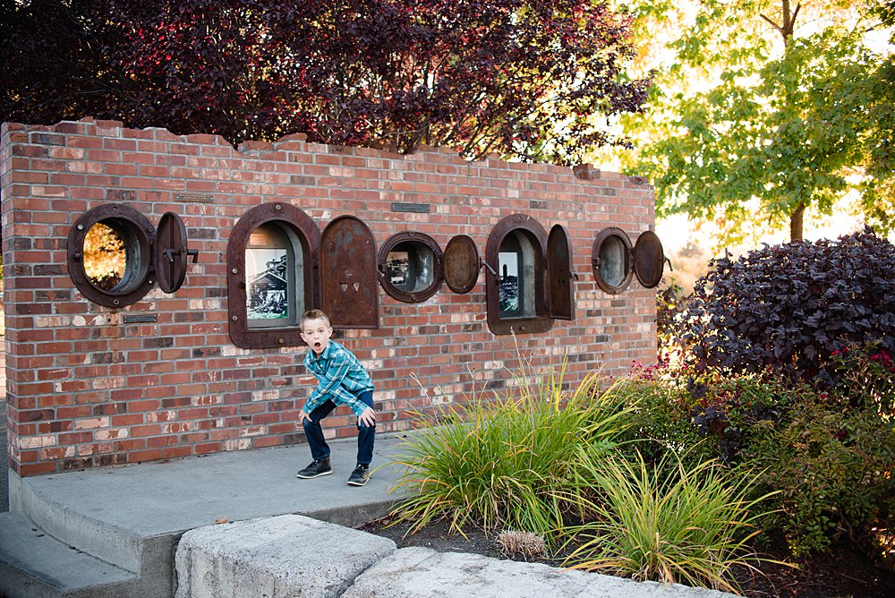  A boy plays around in the Old Mill District 