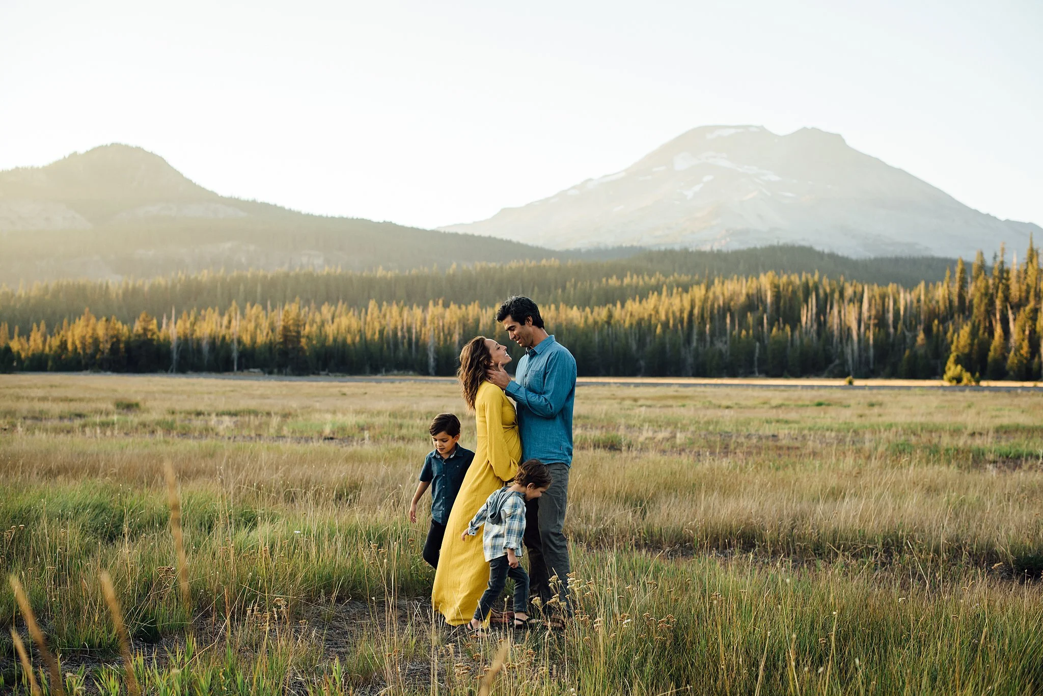 Boys frolic around their parents at Sparks Lake in Bend.