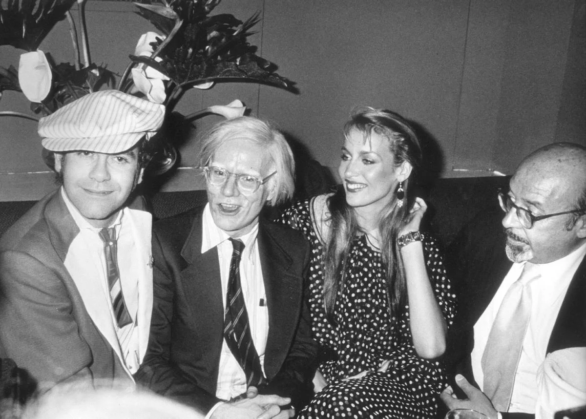 elton-john-andy-warhol-jerry-hall-ahmet-ertegunat-1987.jpg
