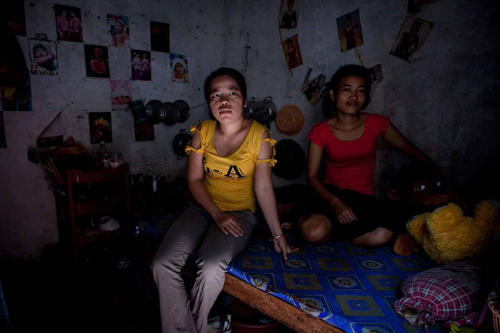 This room is shred by two garment workers. There is a shared public bathroom that the women hesitate to use at night preferring to keep a bucket inside.