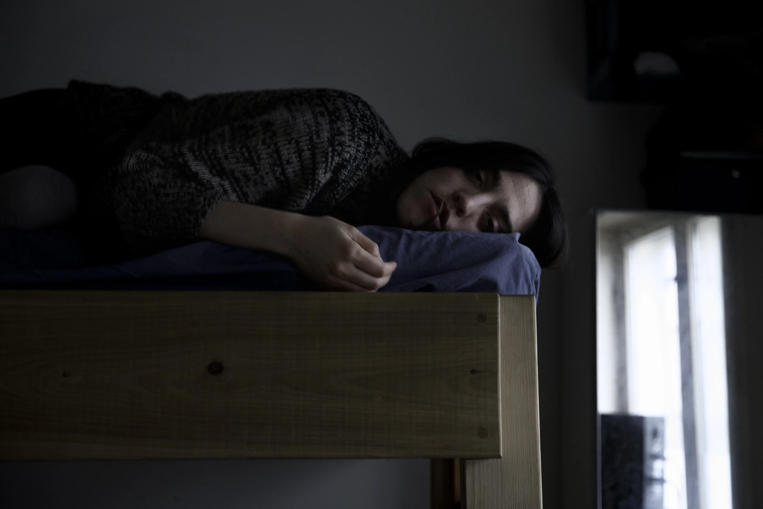Bea relaxes in her makeshift room, Bhaus, Aarhus Denmark 2018