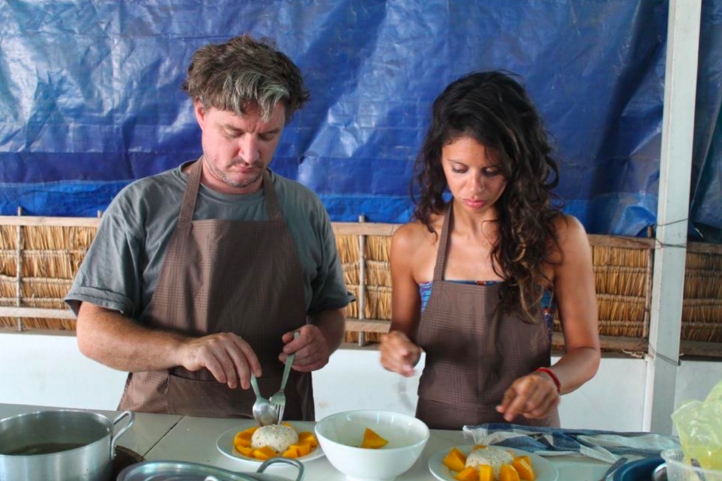 Hillary and Sam Cooking.png