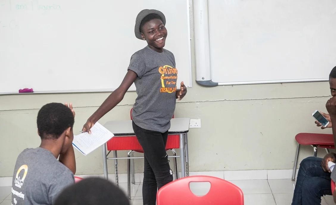 Juliet presents her work to her classmates in the Creative Writing class at #OSICA2016