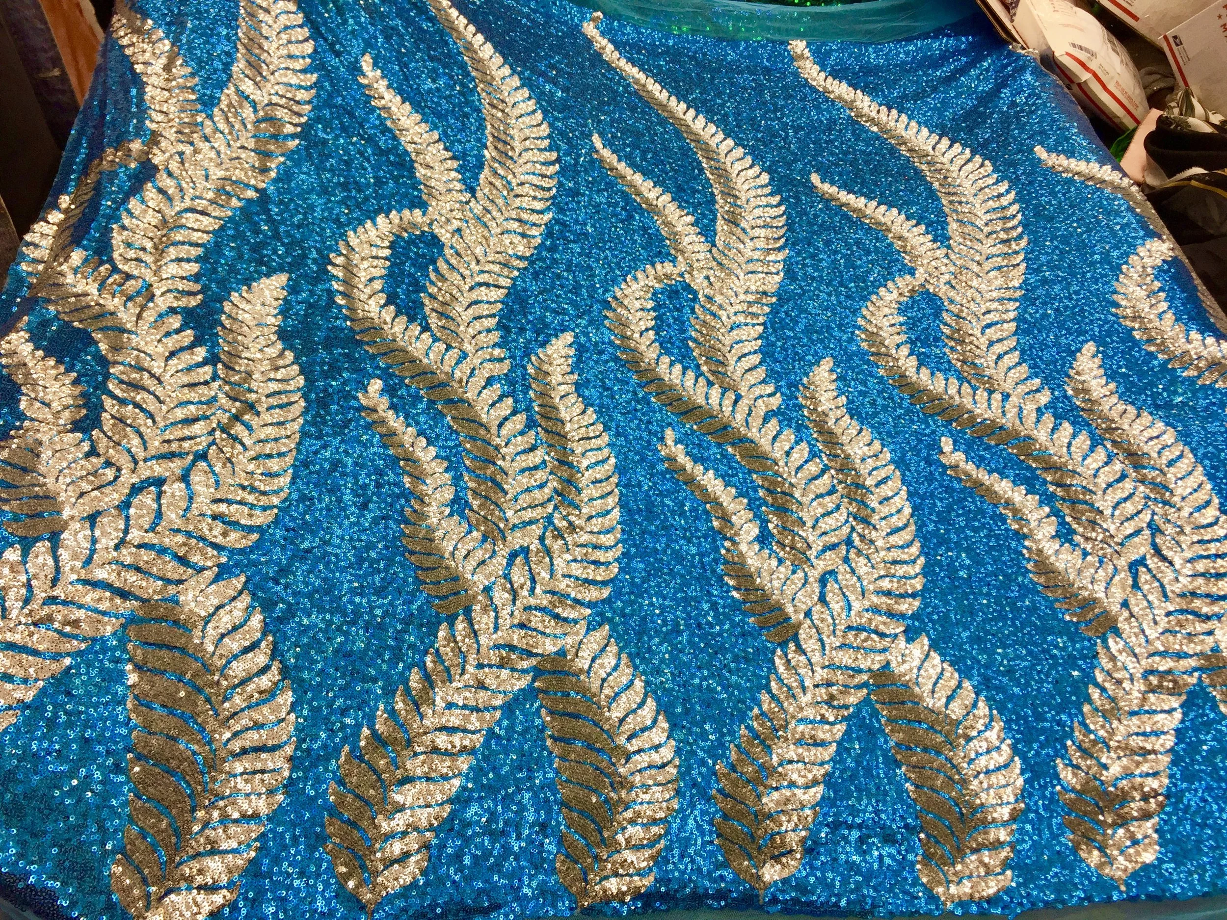 ***NEW*** Ocean Blue with Silver Leaves Sequin Medley on Mesh, 2 way stretch, 54" inch, sold by the yard