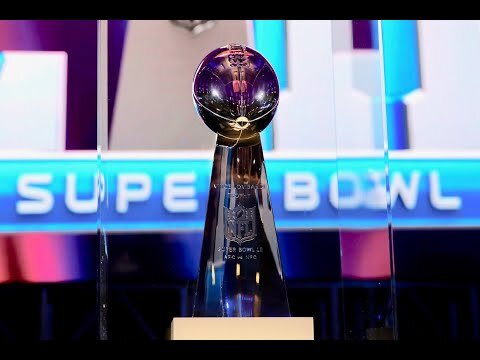 Thousands of Football Fans Party in the Streets on the Eve of the Super Bowl