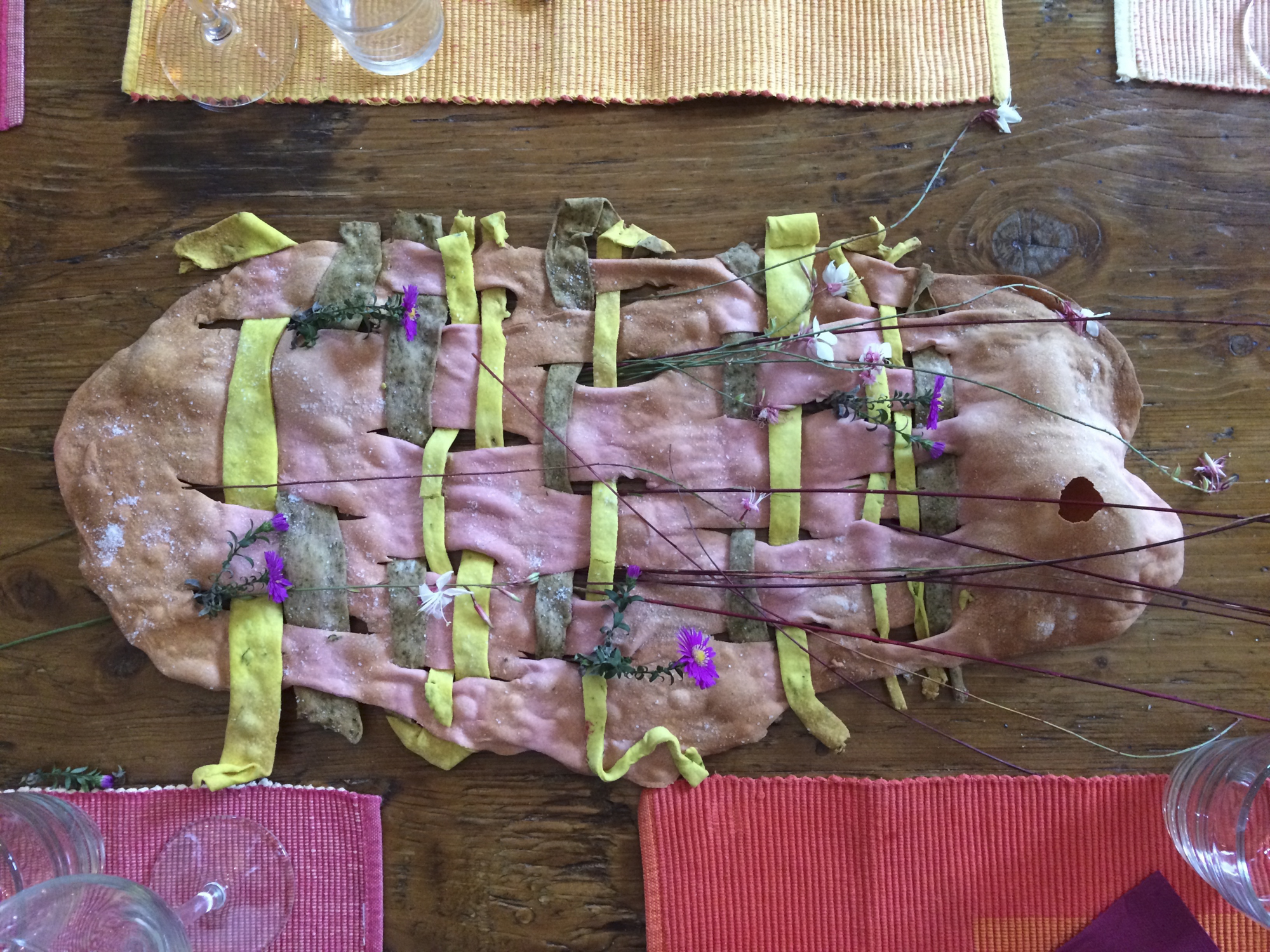 Pasta coloured with vegetable juice, woven (to reflect our work), baked to a crisp then placed on the table to share