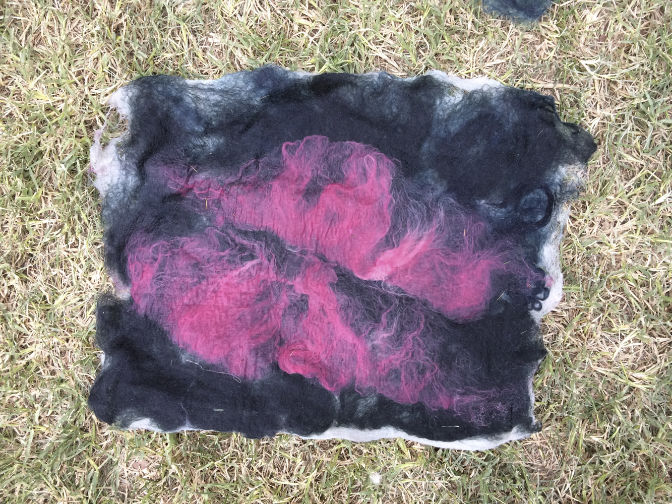 FOREGROUND: PINK SILK BACKGROUND: DARK GREEN + DARK BLUE WOOL.
