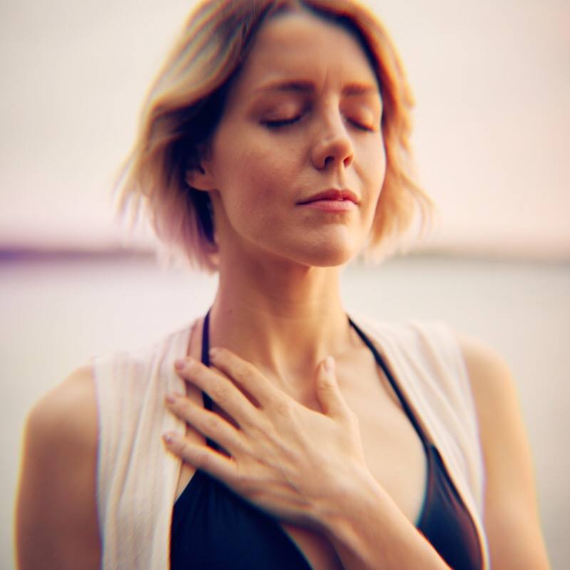 Woman Hand Heart Closed Eyes.jpg