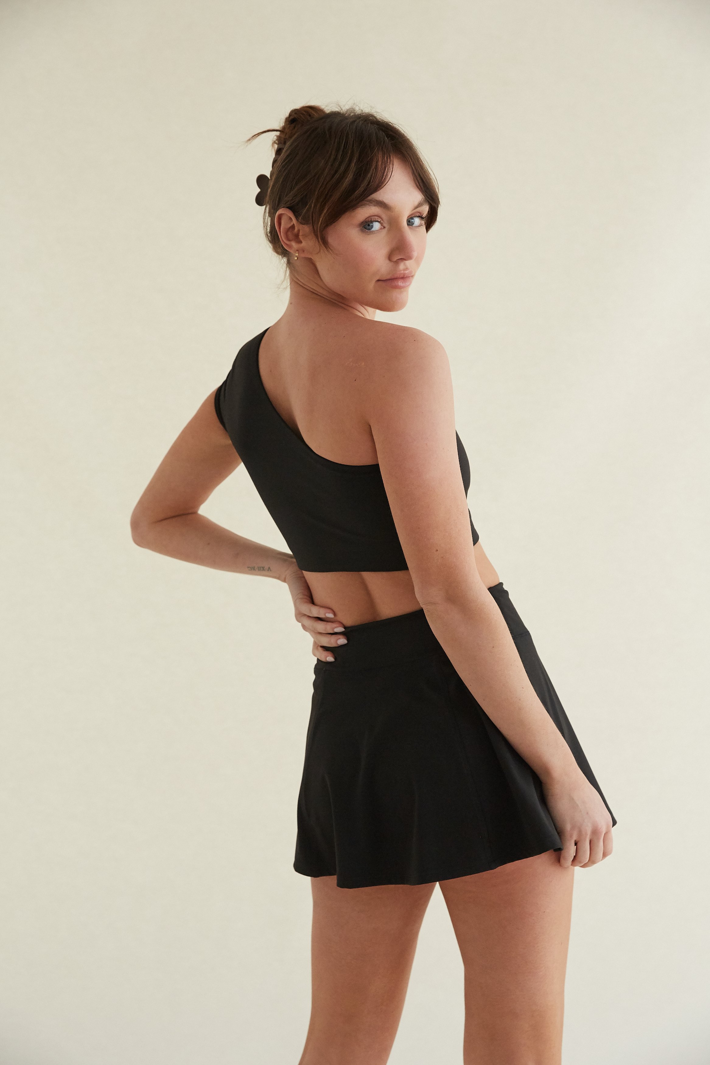 mia-black-one-shoulder-crop-top-avery-black-flare-tennis-skirt-matching-set-sunday-skin-019.jpg