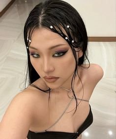 a wet hair look, pearl gems, and smokey eye would be the cherry on top