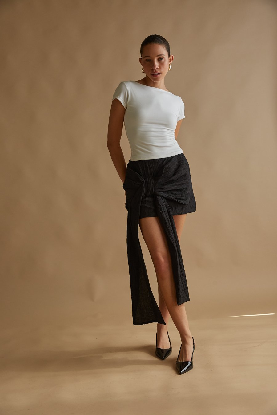 https://www.shopamericanthreads.com/products/georgina-bow-drape-mini-skirt